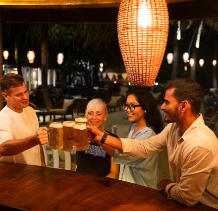 Sun Siyam Iru Fushi Oktober Fest - Guests enjoying by the beach