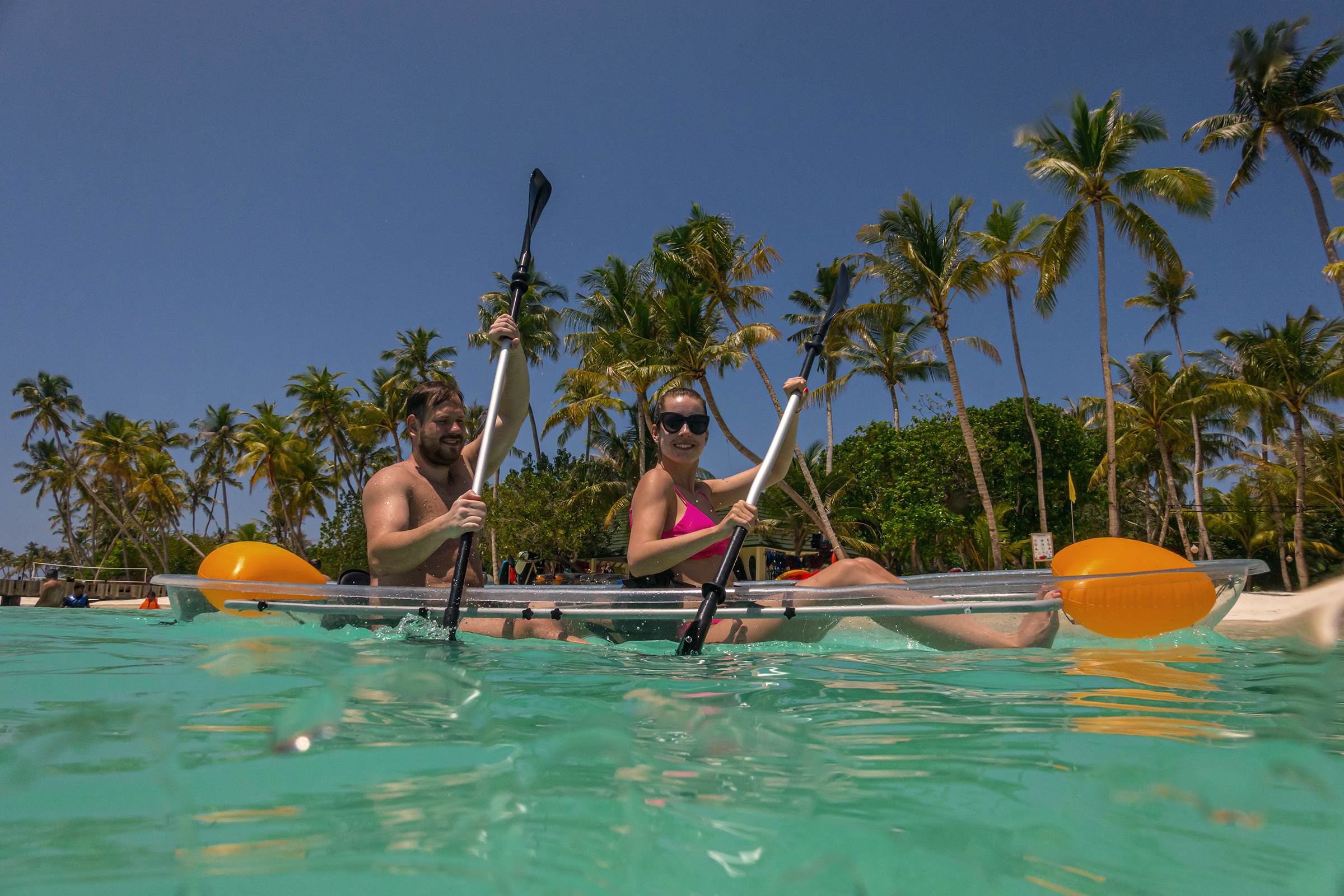 A Couple kayaking at Siyam World Maldives