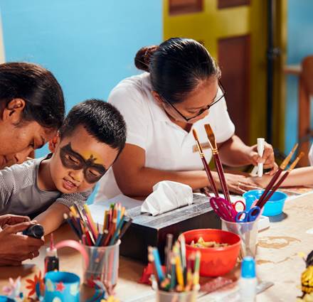 Kids painting at Kids Club in Sun Siyam Iru Fushi, Maldives