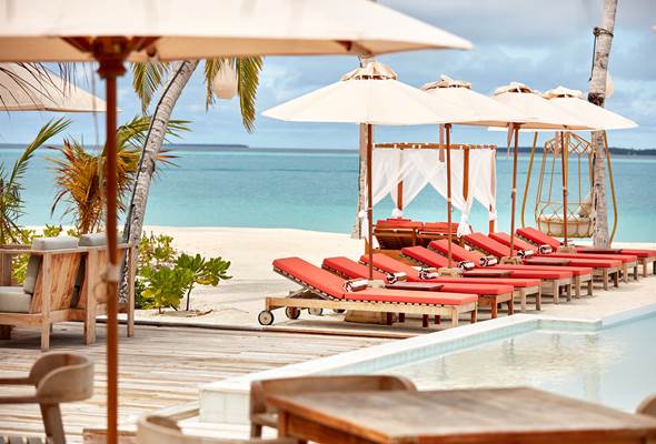 Sun beds by the pool
