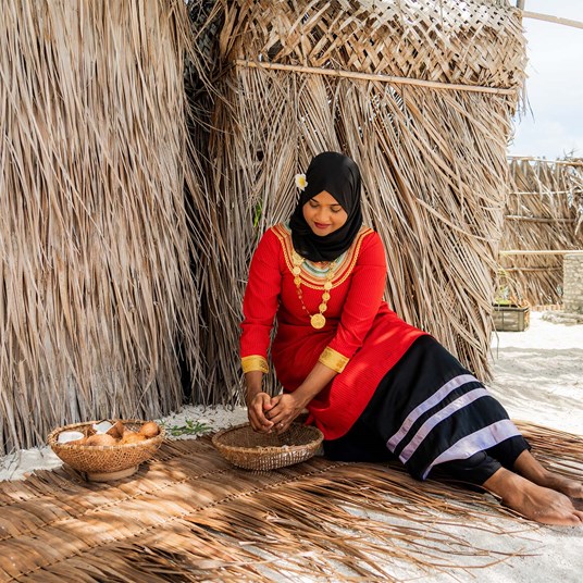 Coconut Husking Sun Siyam Vilu Reef
