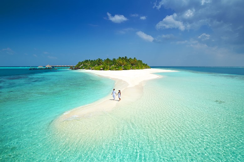 couple walking on beach together