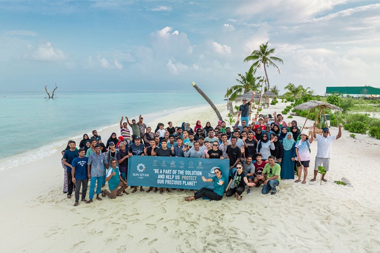 Sun Siyam Iru Fushi Beach Cleaning with Local Community